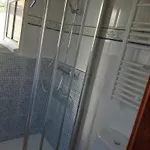 Casa De Madera Sobre El Mar Casa de Férias