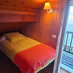 Casa De Madera Sobre El Mar Casa de Férias